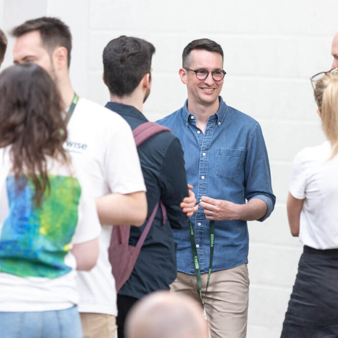 people talking at event