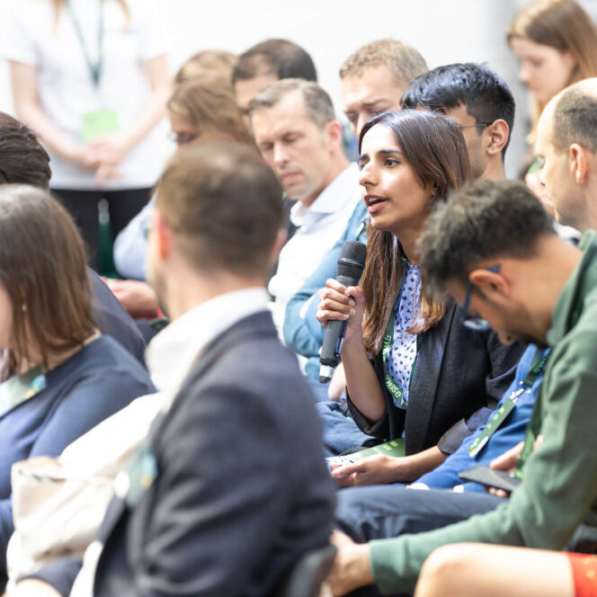 group of people watching talk